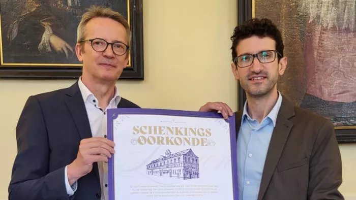 Stad Leuven draagt historische Universiteitshal over aan KU Leuven